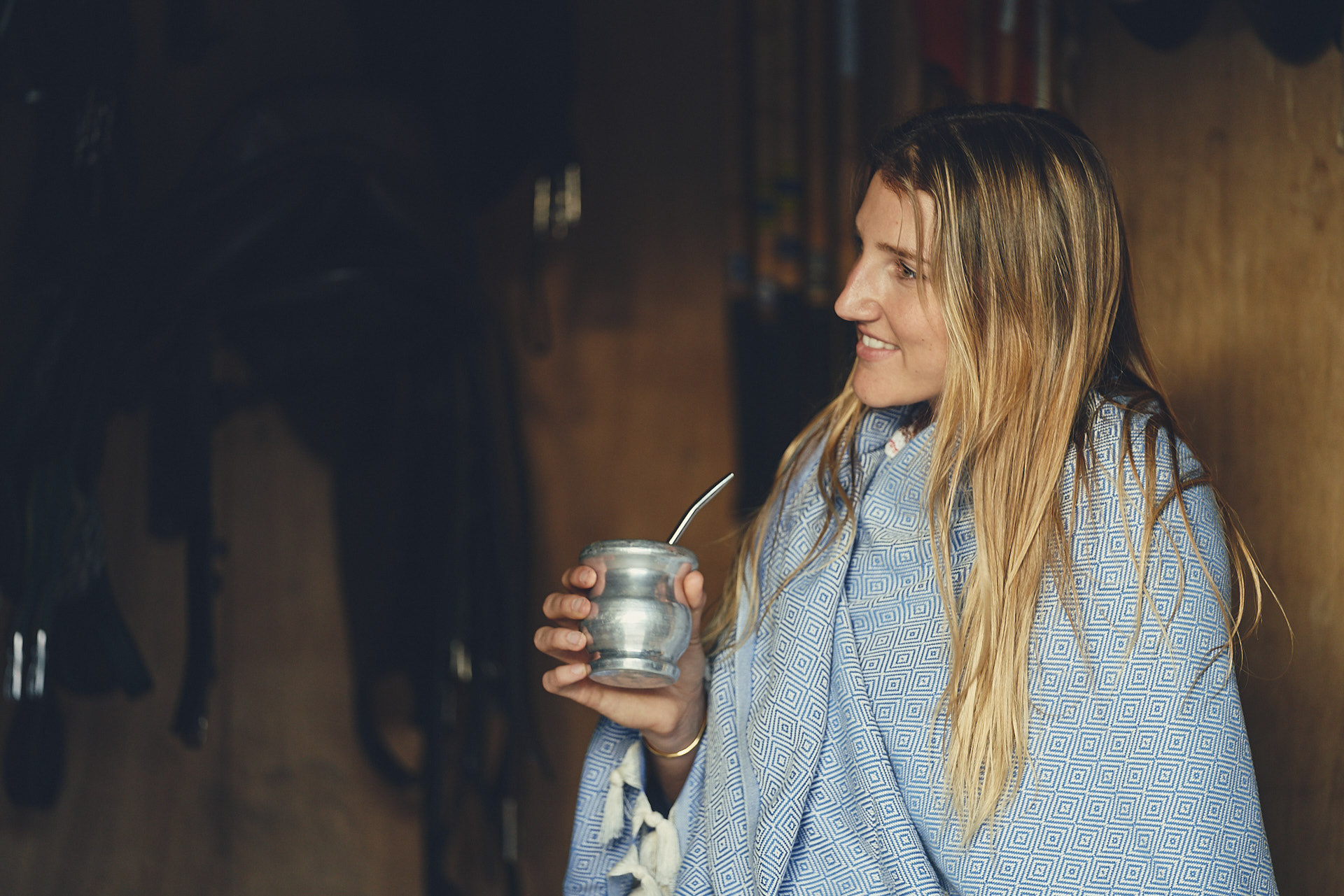 Girl sipping mate wearing a poncho Stick & Ball English Photo Shoot